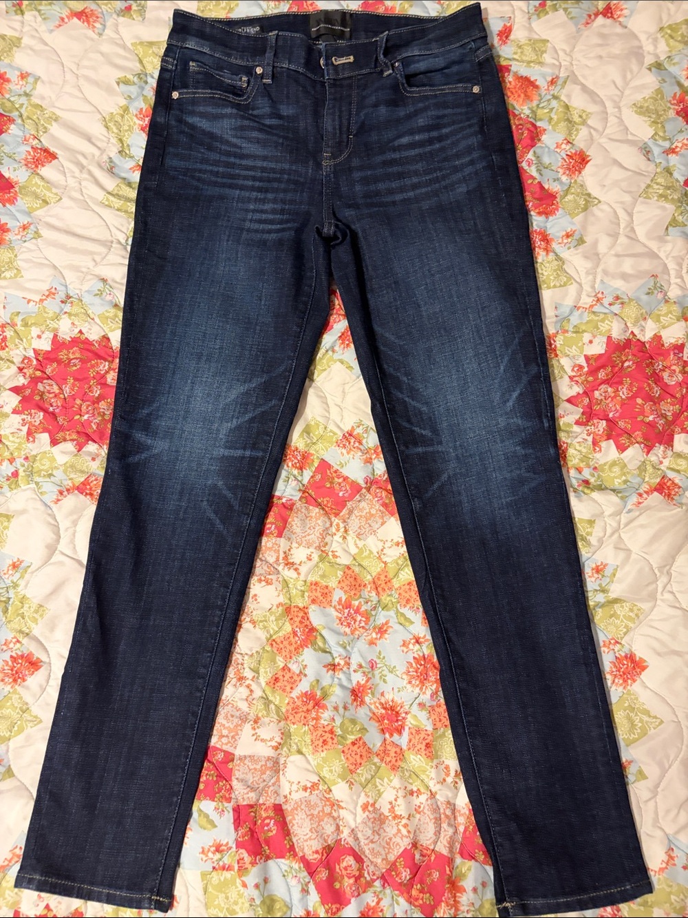 White House black market woman’s mid rise girlfriend jeans size 2